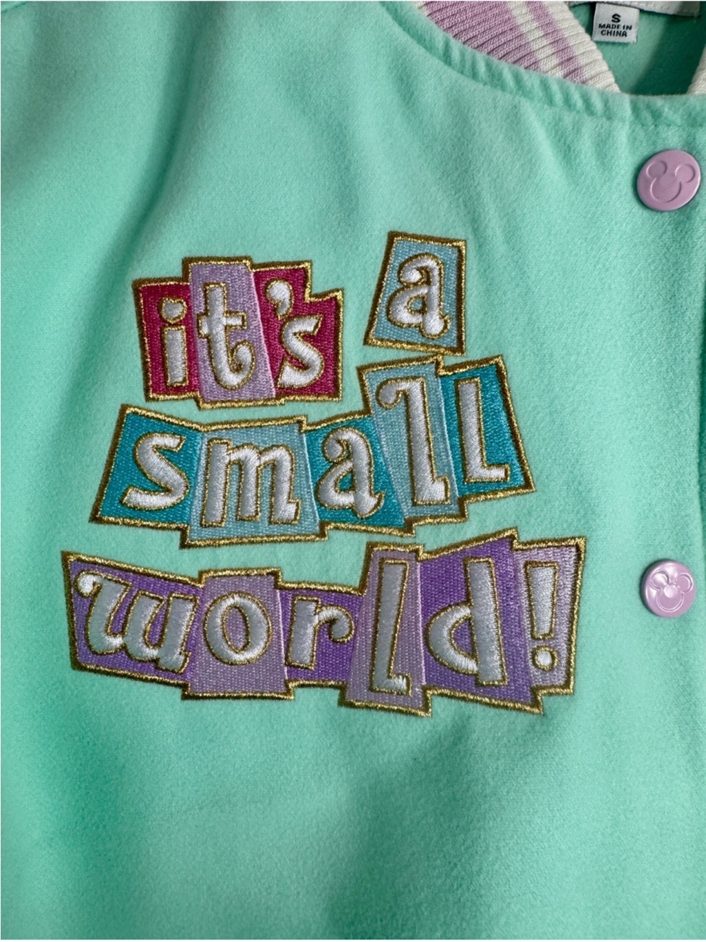 Stoney Clover Lane X Disney Parks 'It's A Small World' Mint Cream Varsity Jacket — image 4 of 8